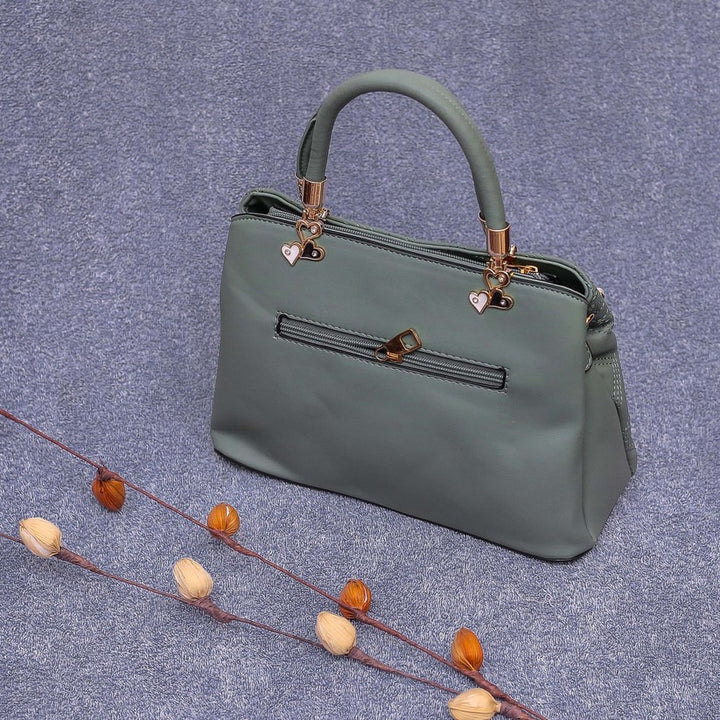 green hand bag